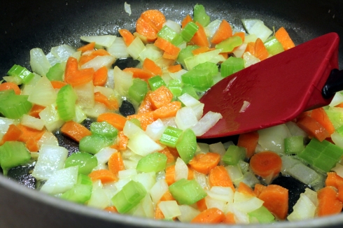 Onions carrots and celery cooking